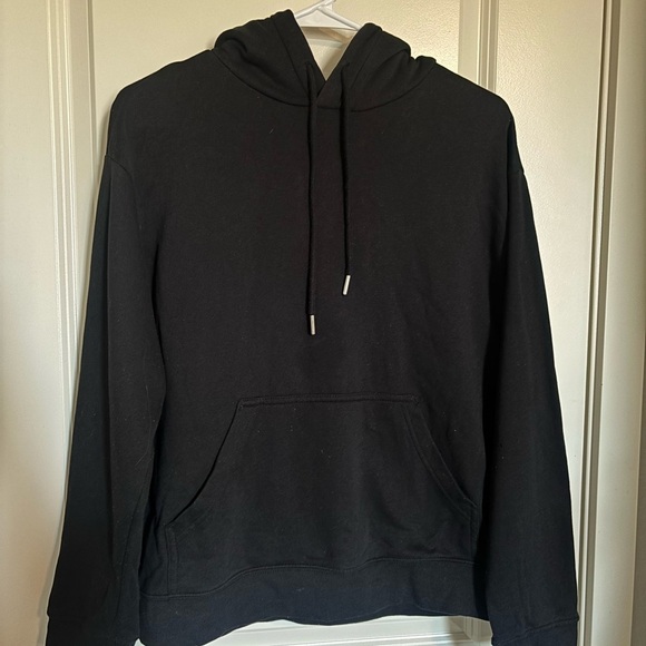 H&M Tops - H&M Black Hoodie with silver aglets. Fits oversized